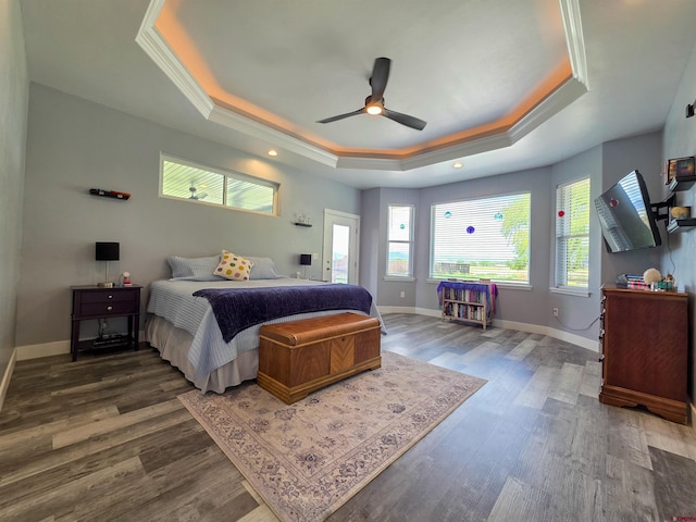 1771 Trappers Ct, Delta, CO 81416 - bedroom with a raised ceiling, wood finished floors, baseboards, crown molding, and ceiling fan