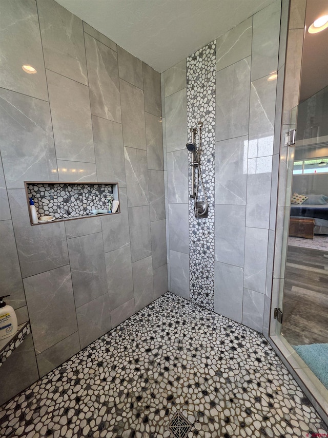 1771 Trappers Ct, Delta, CO 81416 - bathroom featuring a tile shower