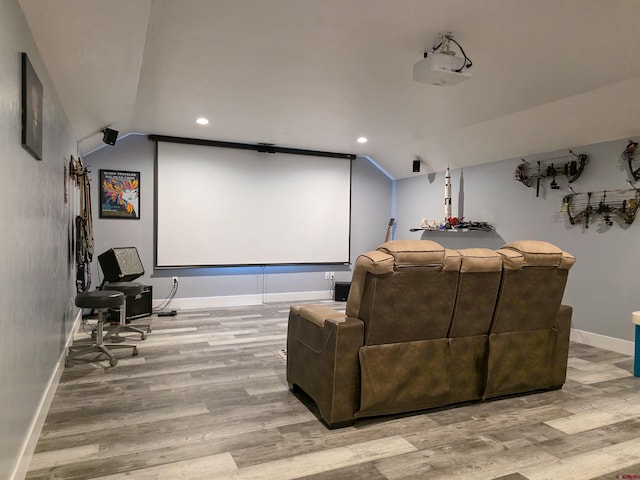 1771 Trappers Ct, Delta, CO 81416 - home theater room with lofted ceiling, baseboards, wood finished floors, and recessed lighting