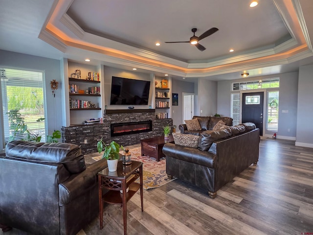 1771 Trappers Ct, Delta, CO 81416 - living room with a raised ceiling, ornamental molding, ceiling fan, wood finished floors, and a fireplace