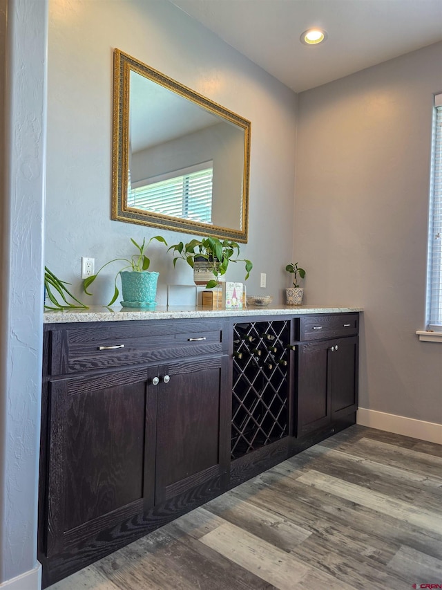 1771 Trappers Ct, Delta, CO 81416 - indoor dry bar featuring dark wood-style floors, baseboards, and recessed lighting