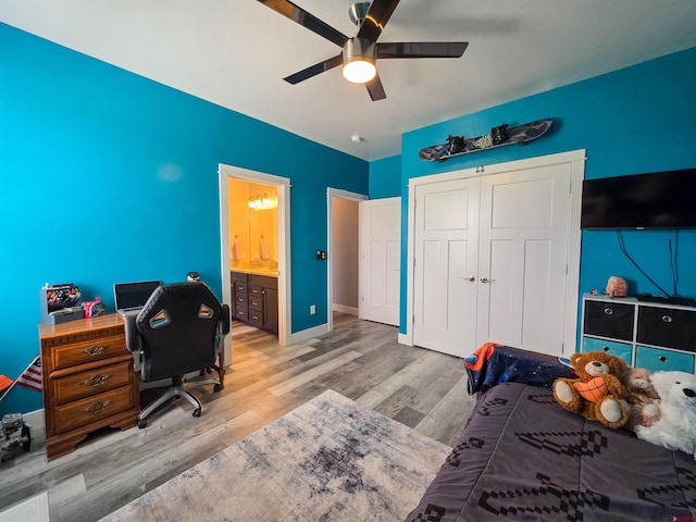 1771 Trappers Ct, Delta, CO 81416 - bedroom with wood finished floors, ceiling fan, an office area, baseboards, and a closet