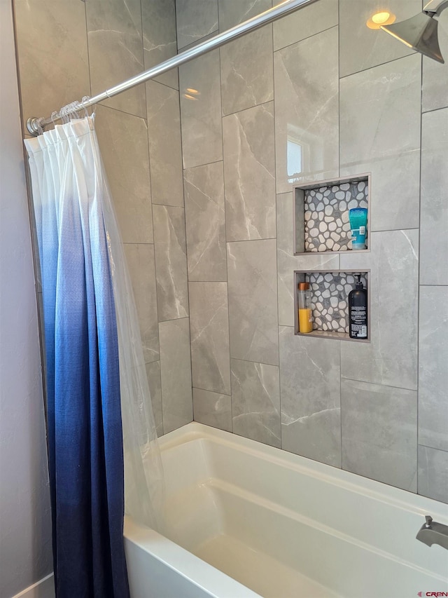 1771 Trappers Ct, Delta, CO 81416 - bathroom featuring shower / bath combo with shower curtain