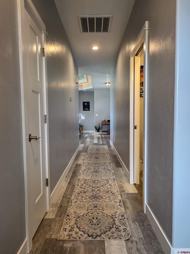 1771 Trappers Ct, Delta, CO 81416 - hallway featuring dark wood-type flooring and baseboards