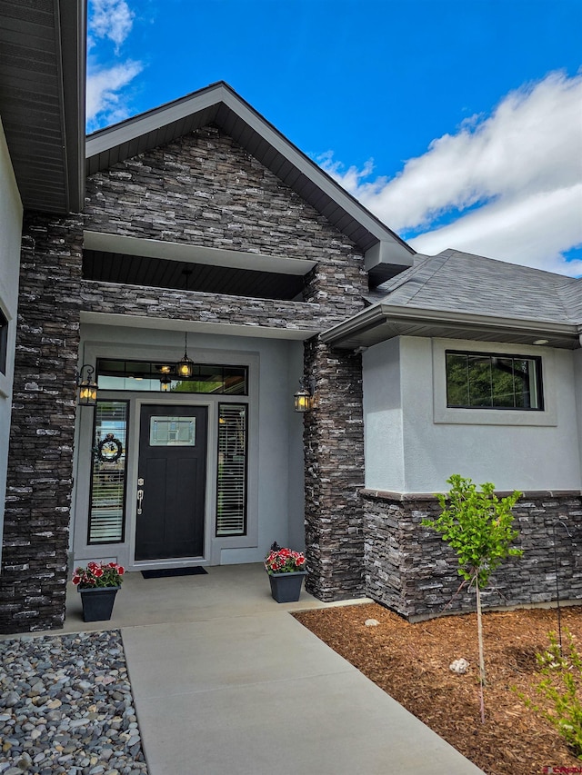 1771 Trappers Ct, Delta, CO 81416 - doorway to property with stone siding and stucco siding