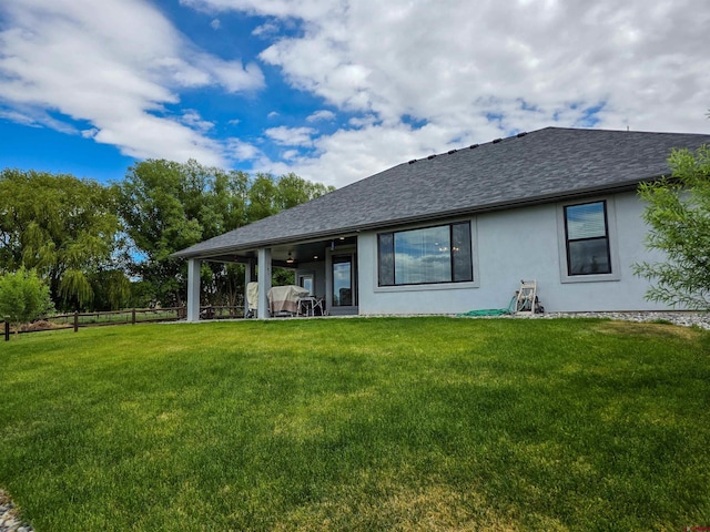 1771 Trappers Ct, Delta, CO 81416 - back of property with stucco siding and roof with shingles
