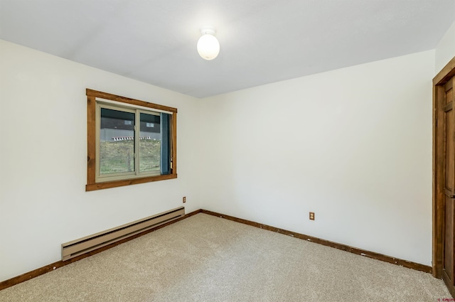 22 Castle Rd Unit 2, Mount Crested Butte, CO 81225 - empty room featuring a baseboard radiator, carpet flooring, and baseboards