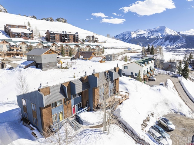 22 Castle Rd Unit 2, Mount Crested Butte, CO 81225 - snowy aerial view featuring a mountain view