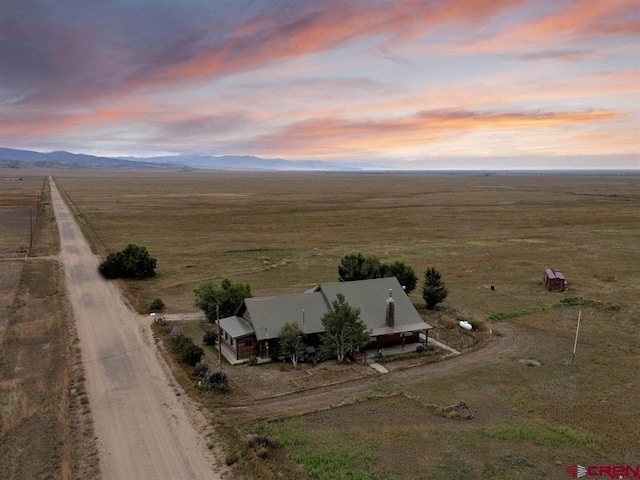 aerial view at dusk of a rural view and a mountain view