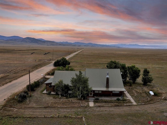 overview of rural landscape featuring a mountain backdrop