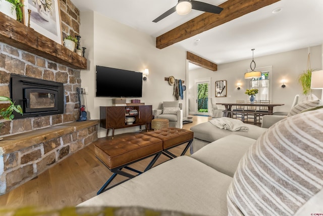 414 N Spruce St, Gunnison, CO 81230 - living room featuring wood finished floors, a ceiling fan, and beam ceiling