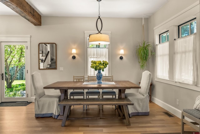414 N Spruce St, Gunnison, CO 81230 - dining area featuring light wood-style flooring, beamed ceiling, and baseboards