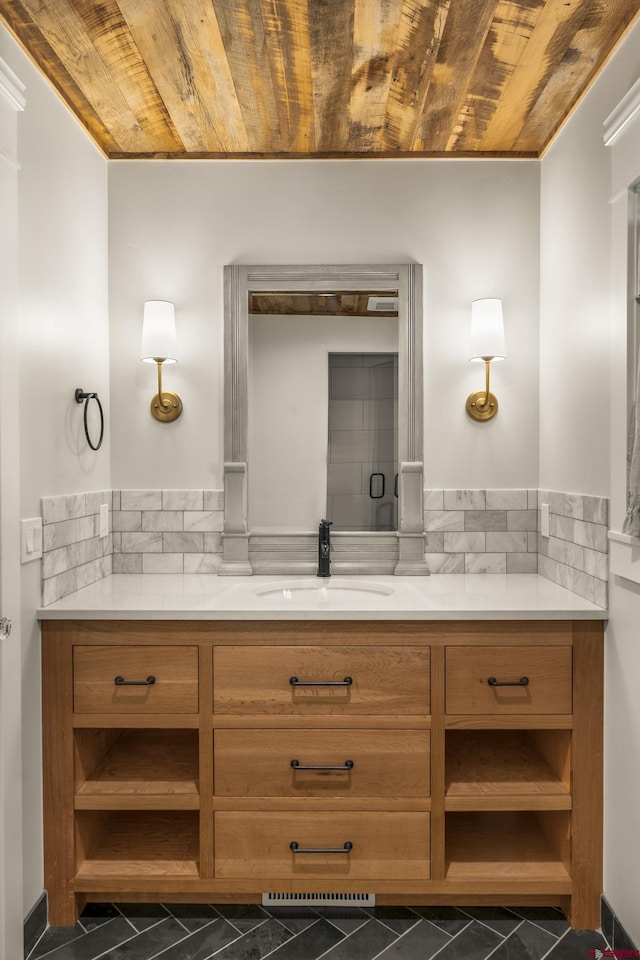 414 N Spruce St, Gunnison, CO 81230 - bathroom featuring wooden ceiling and vanity