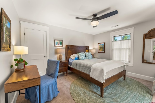 414 N Spruce St, Gunnison, CO 81230 - bedroom featuring light carpet, ceiling fan, and baseboards