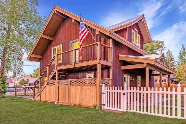 414 N Spruce St, Gunnison, CO 81230 - view of front of home with a gate and metal roof