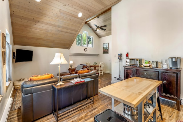 414 N Spruce St, Gunnison, CO 81230 - living area featuring a ceiling fan, wood ceiling, wood finished floors, baseboards, and high vaulted ceiling