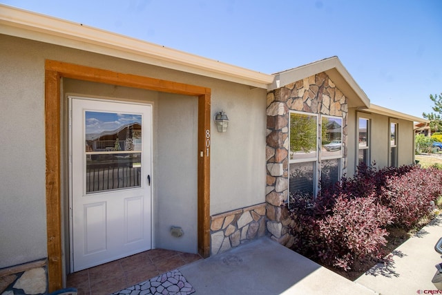 801 L Way, Cortez, CO 81321 - view of exterior entry with stone siding and stucco siding