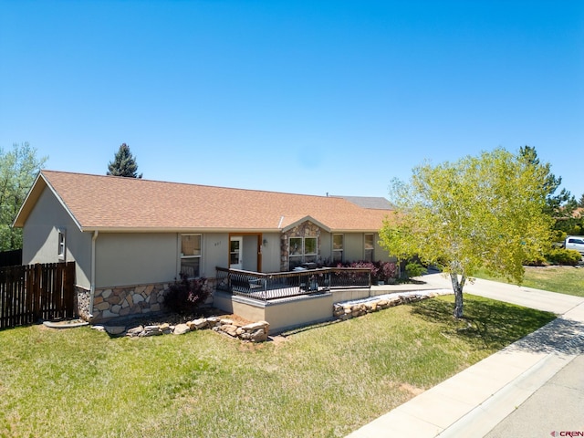 801 L Way, Cortez, CO 81321 - ranch-style house featuring stucco siding, roof with shingles, and stone siding