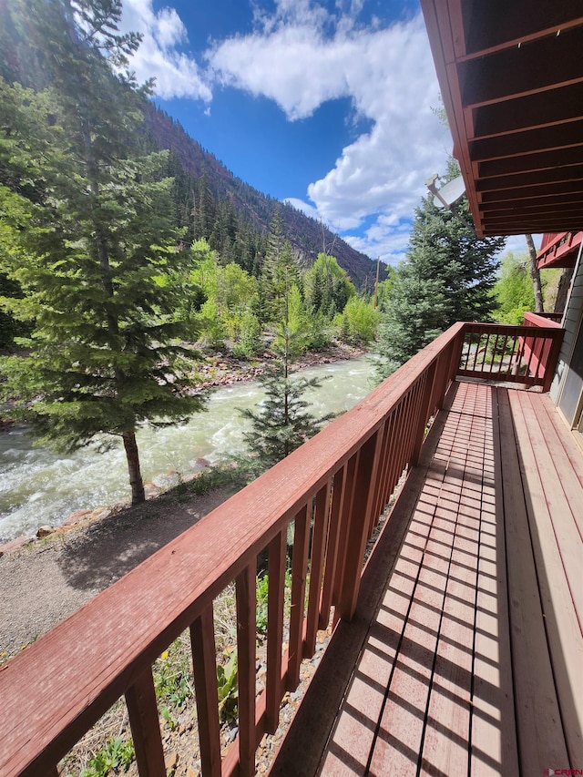 1286 Main St Unit 2, Ouray, CO 81432 - wooden deck featuring a mountain view and a forest view