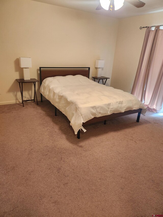 1286 Main St Unit 2, Ouray, CO 81432 - bedroom with carpet floors and ceiling fan