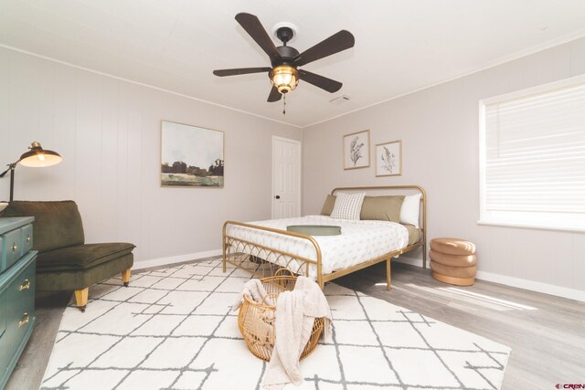 1749 N 15th St, Grand Junction, CO 81501 - bedroom with light wood-style floors, baseboards, crown molding, and ceiling fan