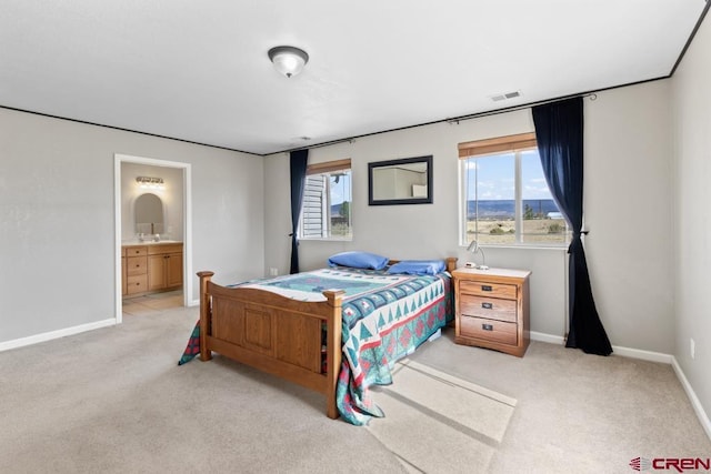 19496 E Rd, Delta, CO 81416 - bedroom featuring carpet floors, multiple windows, and baseboards