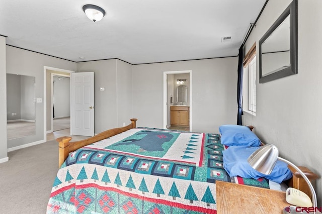 19496 E Rd, Delta, CO 81416 - carpeted bedroom with ensuite bathroom and baseboards