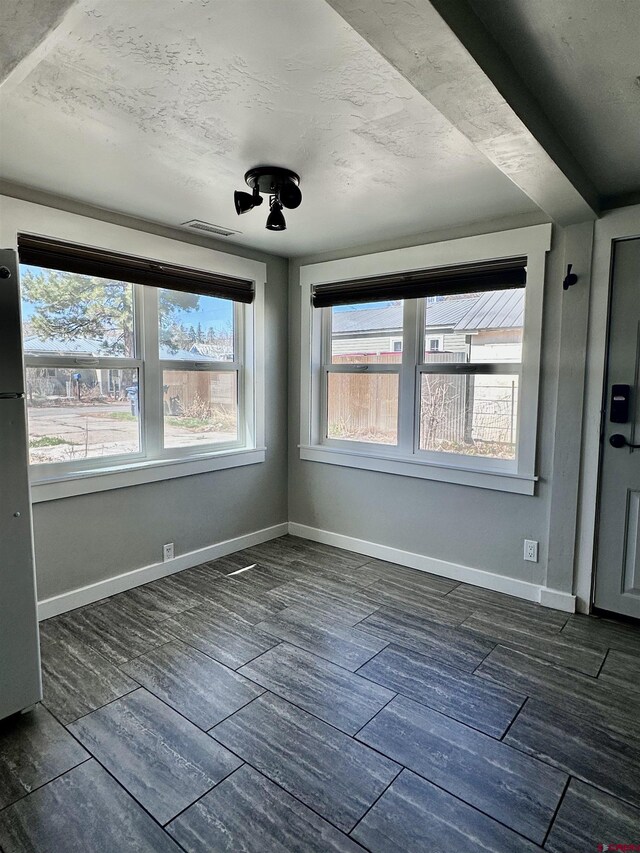 2375 W 2nd Ave, Durango, CO 81301 - unfurnished dining area with wood finish floors and baseboards