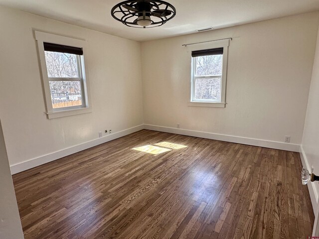 2375 W 2nd Ave, Durango, CO 81301 - unfurnished room featuring a ceiling fan, wood finished floors, and baseboards