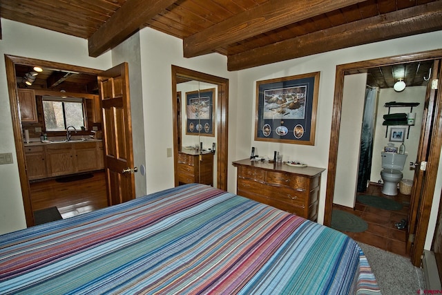 bedroom with wood ceiling, beamed ceiling, ensuite bathroom, and bar