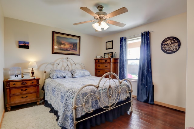 1546 Golf Course Ln, Cortez, CO 81321 - bedroom with baseboards, hardwood / wood-style flooring, and ceiling fan