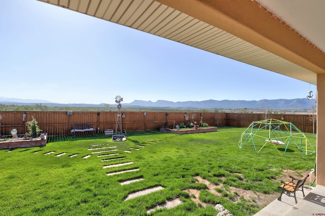 1546 Golf Course Ln, Cortez, CO 81321 - view of yard featuring a playground, a garden, and a mountain view