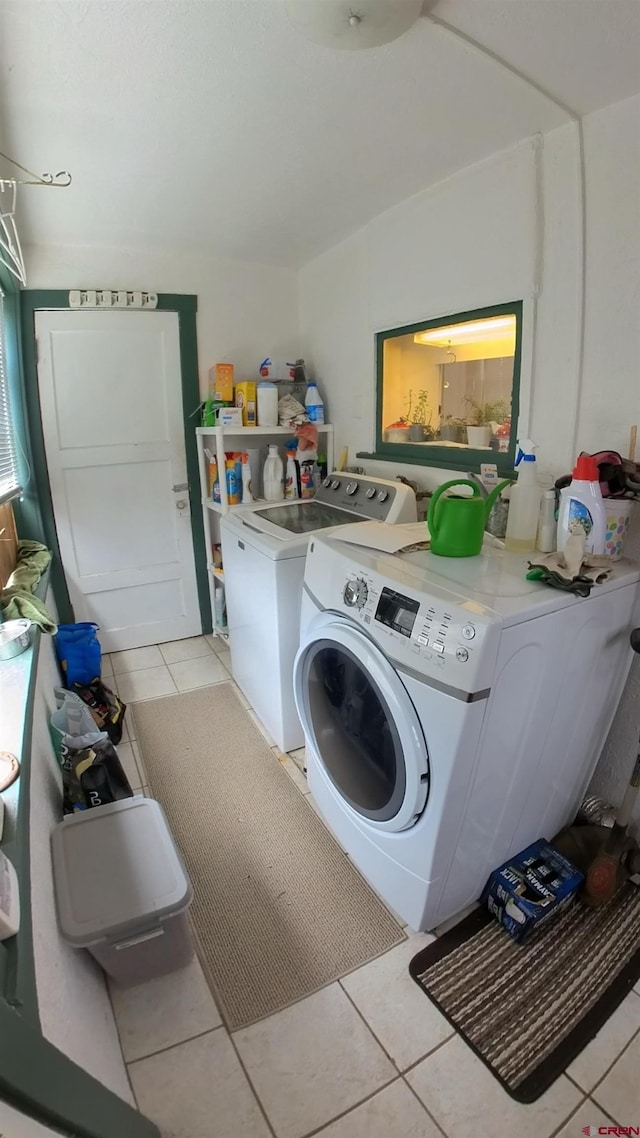 230 NW 5th St, Cedaredge, CO 81413 - laundry room with independent washer and dryer and light tile patterned floors