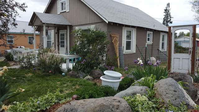 230 NW 5th St, Cedaredge, CO 81413 - view of front of property featuring a shingled roof
