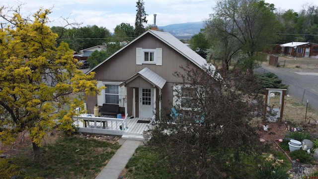 230 NW 5th St, Cedaredge, CO 81413 - bungalow-style home featuring a deck and an outdoor living space