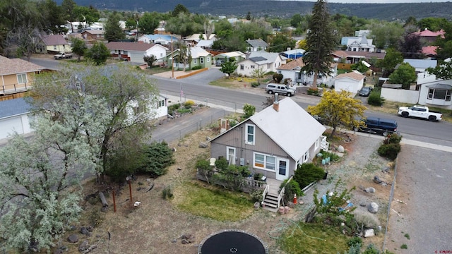 230 NW 5th St, Cedaredge, CO 81413 - aerial perspective of suburban area featuring a mountain backdrop