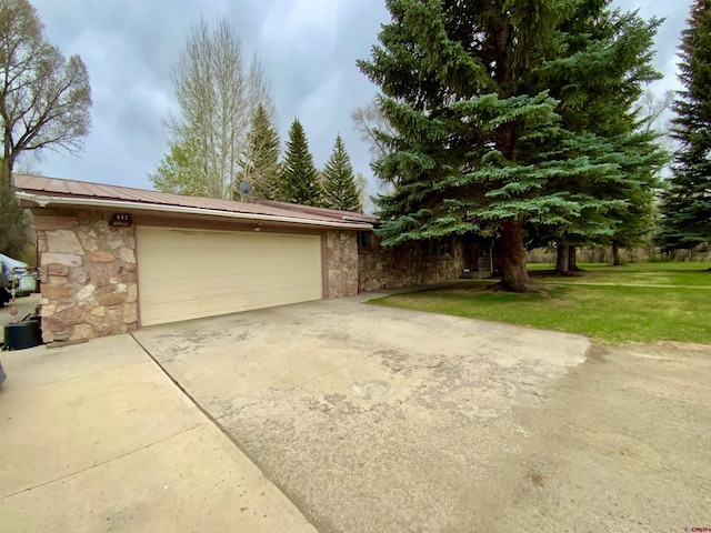 622 Rio Vista Rd, Gunnison, CO 81230 - garage featuring driveway