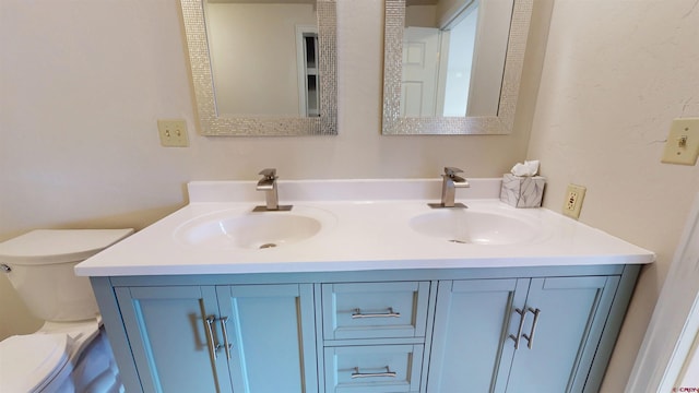 15 Tomichi Ln, Gunnison, CO 81230 - full bathroom featuring toilet and double vanity