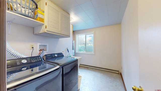 15 Tomichi Ln, Gunnison, CO 81230 - washroom with a baseboard heating unit, cabinet space, and washing machine and clothes dryer