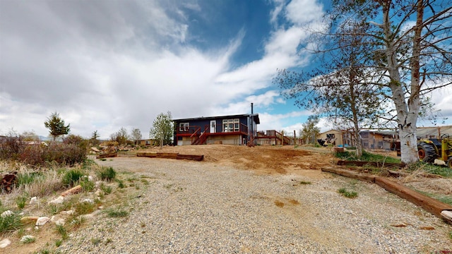 15 Tomichi Ln, Gunnison, CO 81230 - view of front facade featuring stairway and a deck