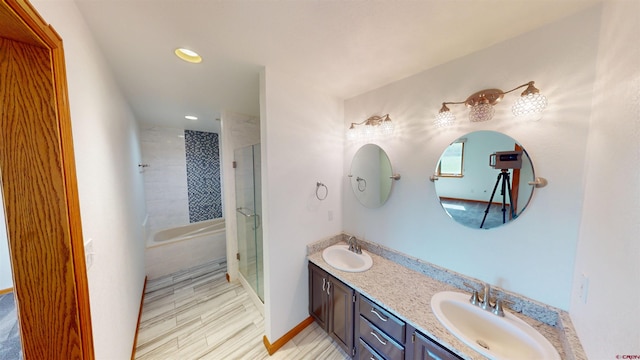 15 Sunnybrook Pl, Alamosa, CO 81101 - full bathroom with a shower stall, double vanity, and recessed lighting