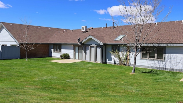 15 Sunnybrook Pl, Alamosa, CO 81101 - rear view of house with a patio area, roof with shingles, and central AC unit