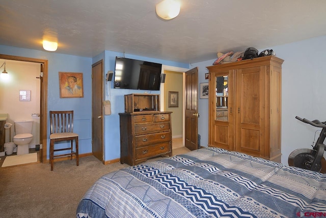 402 Sopris Ave, Crested Butte, CO 81224 - carpeted bedroom with baseboards and connected bathroom