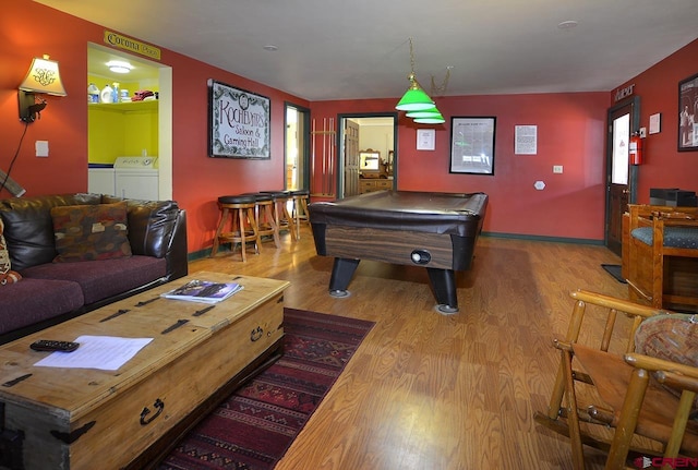 402 Sopris Ave, Crested Butte, CO 81224 - recreation room with washer and clothes dryer, wood finished floors, and billiards
