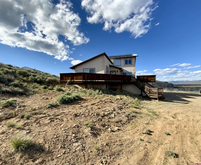 865 County Road 17, Gunnison, CO 81230 - rear view of house featuring a deck