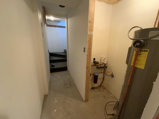 865 County Road 17, Gunnison, CO 81230 - hall with gas water heater and concrete floors