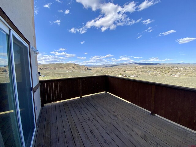 865 County Road 17, Gunnison, CO 81230 - wooden deck with a mountain view