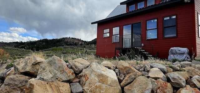 11975 US Highway 50, Gunnison, CO 81230 - view of side of property featuring metal roof and a mountain view