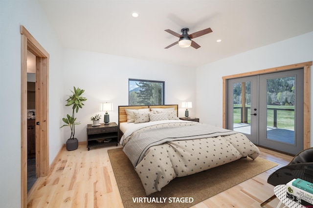 26217 Rd 38.5, Dolores, CO 81323 - bedroom featuring access to exterior, french doors, light wood-style floors, multiple windows, and recessed lighting