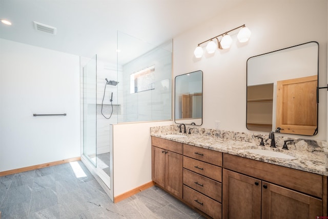 26217 Rd 38.5, Dolores, CO 81323 - bathroom featuring walk in shower, double vanity, and baseboards